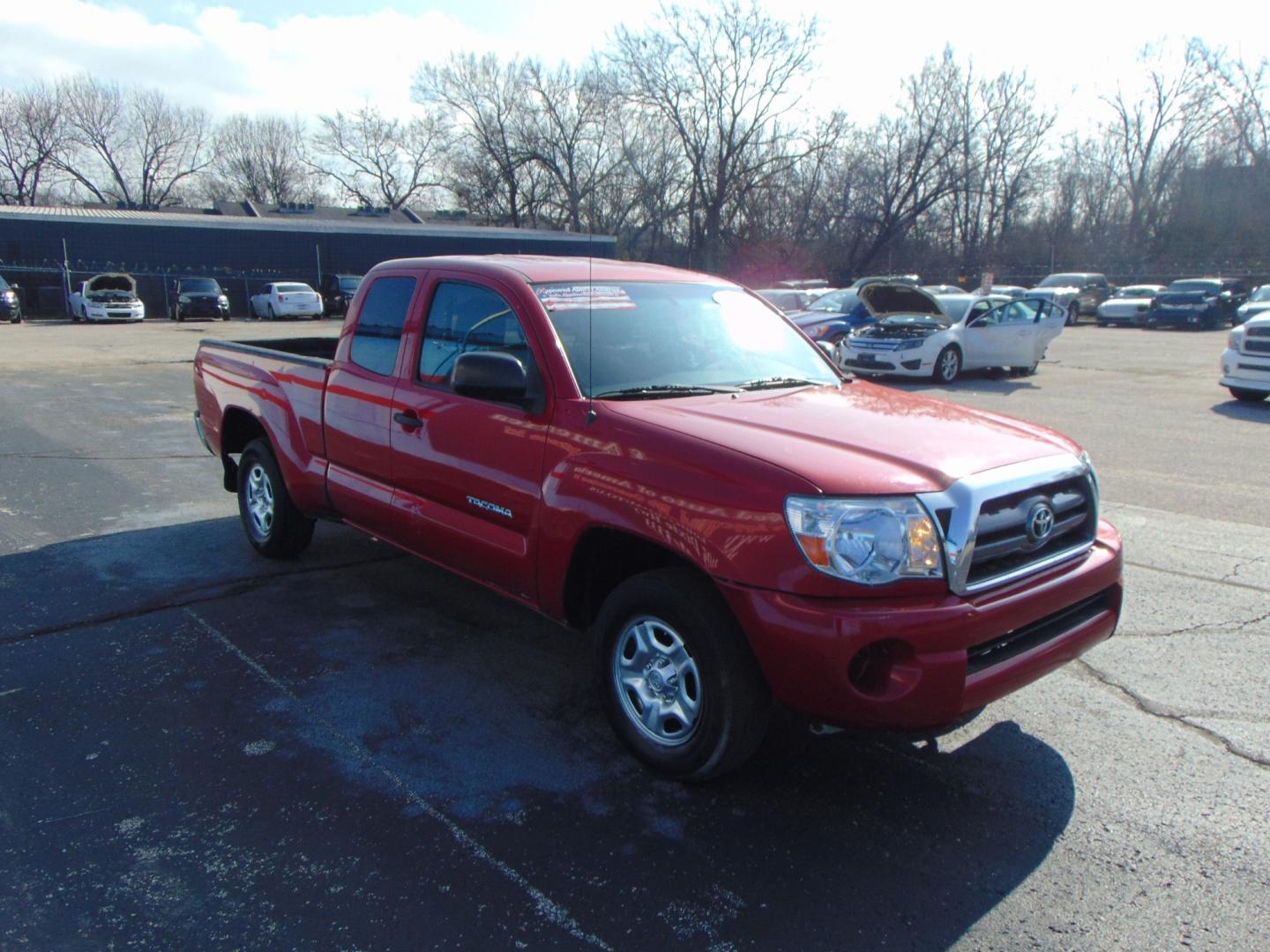 2009 Red Toyota Tacoma Access Cab (5TETX22N49Z) with an 4-Cyl 2.7 Liter engine, Manual, 5-Spd w/Overdrive transmission, located at 2105 Dixie Hwy, Louisville, KY, 40210, (502) 772-3333, 38.220932, -85.795441 - Photo#4